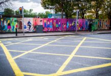 संघर्षमा बसेको प्रदेश २ सरकार र राजनीतिक दलहरू purple and white graffiti on wall