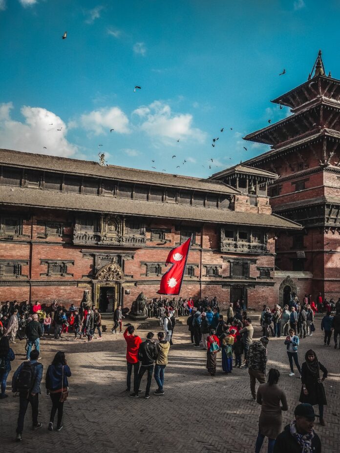 people standing near building during daytime