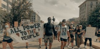 नेपालको राष्ट्रपति ने प्रधानमन्त्रीको प्रस्ताव पारित गरें people walking on street during daytime